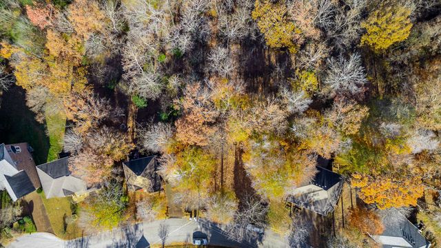 a aerial view of residential houses with outdoor space