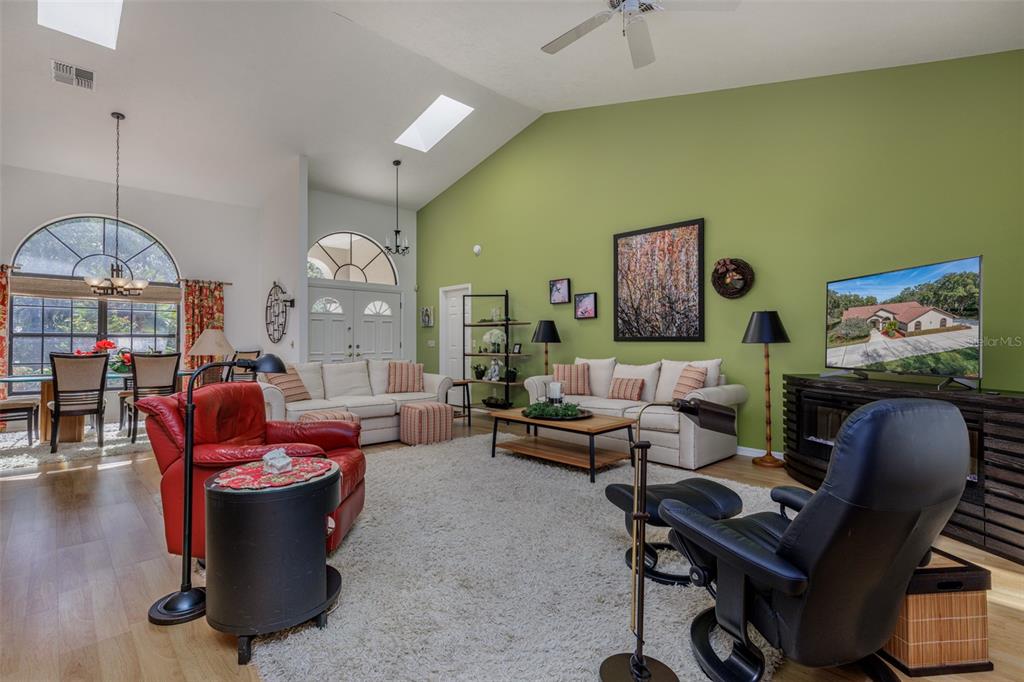 115 East Ireland Court Hernando, FL 34442 - Photo 27 of 55 a living room with furniture a rug and a window