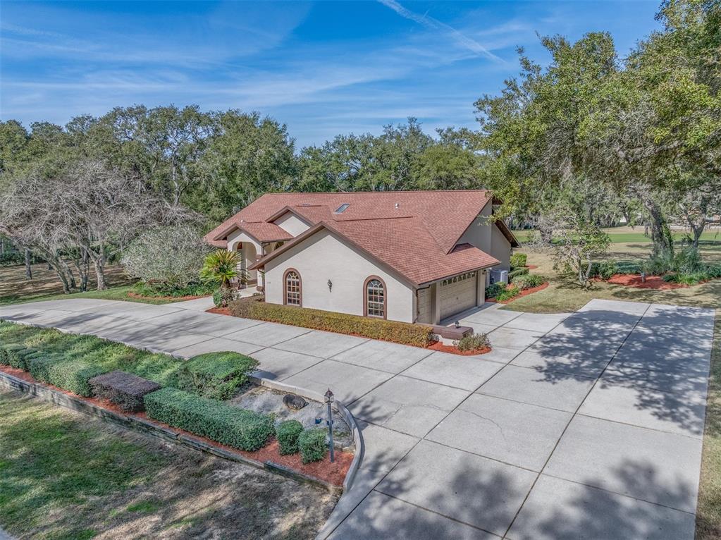115 East Ireland Court Hernando, FL 34442 - Photo 46 of 55 a aerial view of a house next to a yard