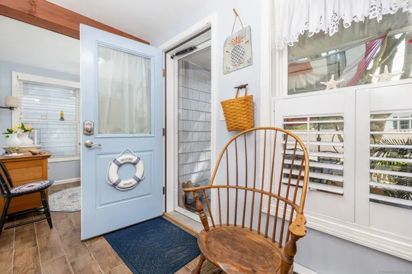 a kitchen with stainless steel appliances a refrigerator sink and microwave