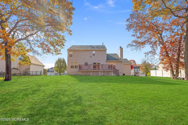 a view of a garden with a building in the background