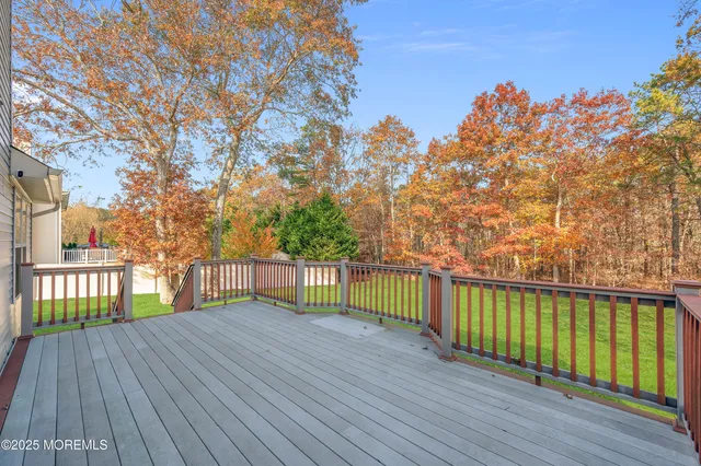 a balcony with wooden floor