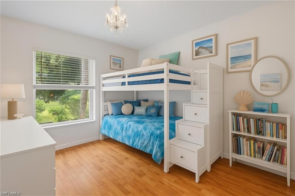6060 Painted Leaf Lane Naples, FL 34116 - Photo 20 of 49 a bedroom with furniture and a window