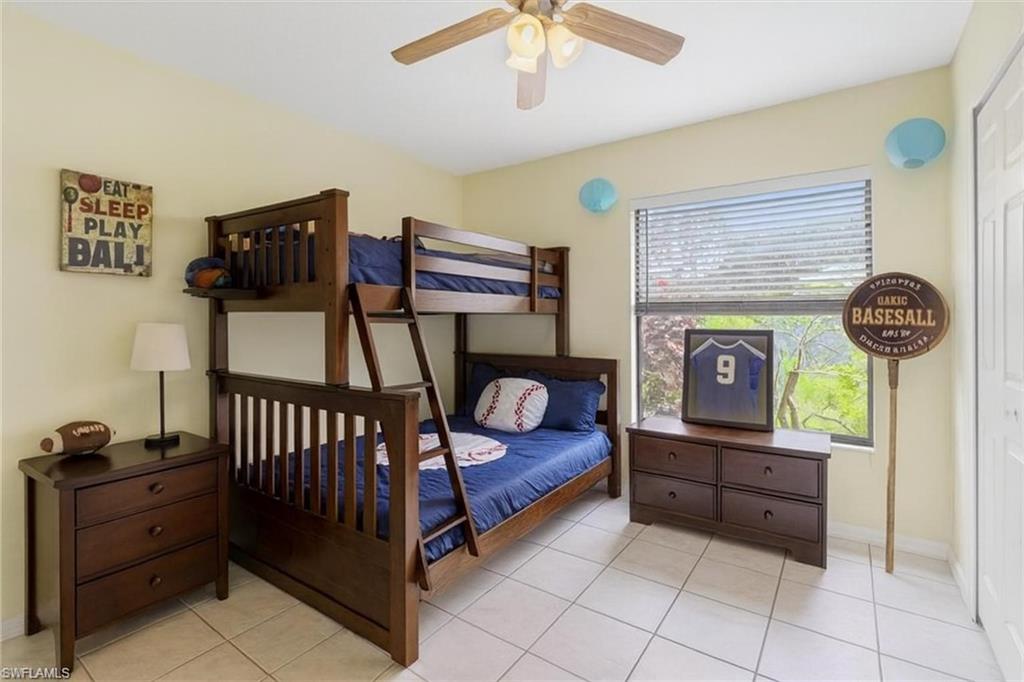 6060 Painted Leaf Lane Naples, FL 34116 - Photo 21 of 49 a living room with furniture