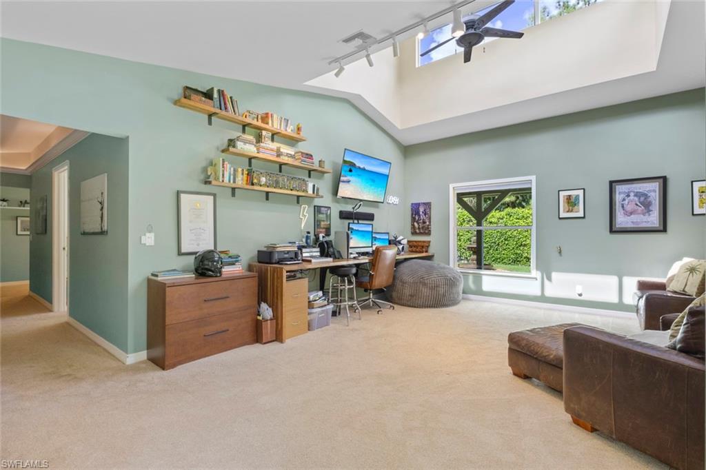 6060 Painted Leaf Lane Naples, FL 34116 - Photo 25 of 49 a living room with furniture