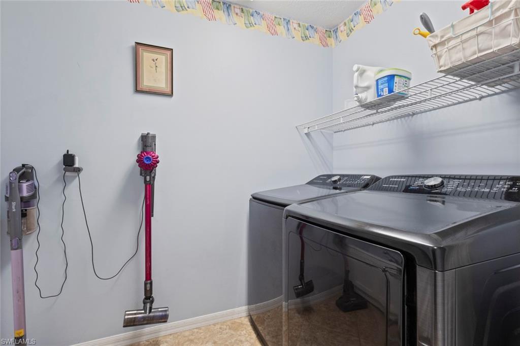6060 Painted Leaf Lane Naples, FL 34116 - Photo 29 of 49 a utility room with a shower