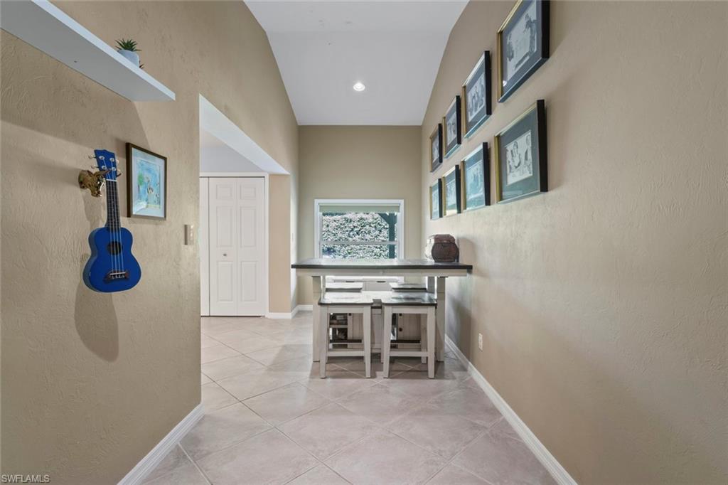 6060 Painted Leaf Lane Naples, FL 34116 - Photo 36 of 49 a view of kitchen with furniture and window