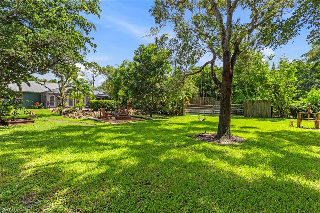 6060 Painted Leaf Lane Naples, FL 34116 - Photo 42 of 49 a view of park with trees
