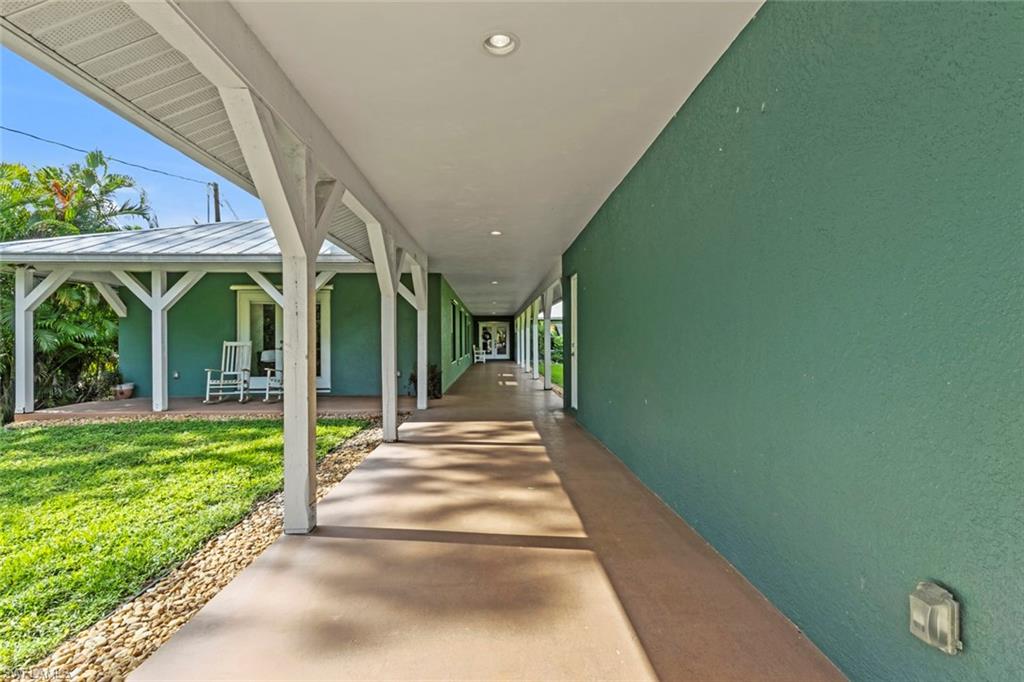 6060 Painted Leaf Lane Naples, FL 34116 - Photo 48 of 49 a view of a porch with a backyard