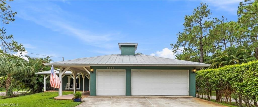6060 Painted Leaf Lane Naples, FL 34116 - Photo 49 of 49 a view of a bird house