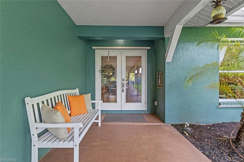 6060 Painted Leaf Lane Naples, FL 34116 - Photo 5 of 49 a outdoor space with a couch