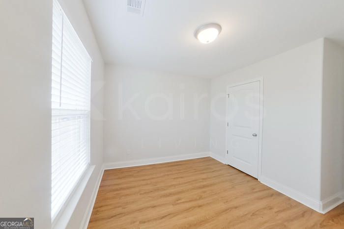 231 Western Red Cedar Drive Springfield, GA 31329 - Photo 15 of 26 a view of empty room with wooden floor
