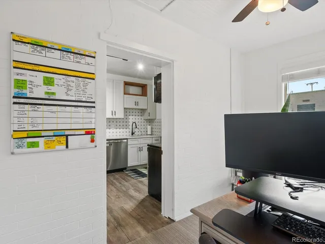 a view of cabinets and window