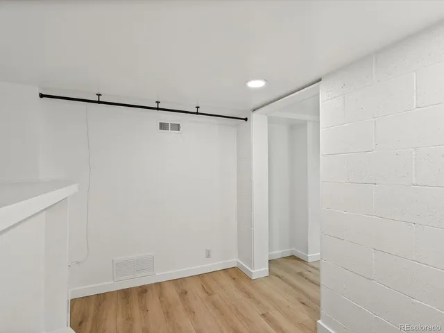 a utility room with sink dryer and washer