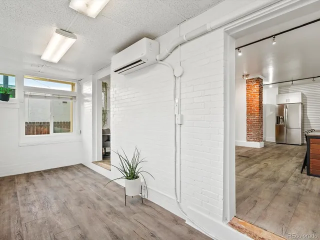 a view of a living room and entry way