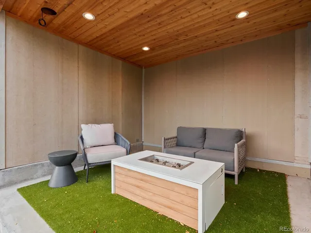 a backyard of a house with seating space