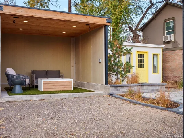 a view of a porch with wooden floor