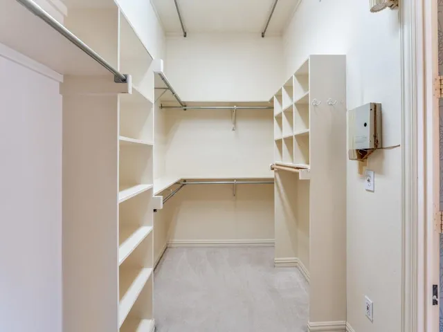 a bathroom with a toilet a sink and a mirror