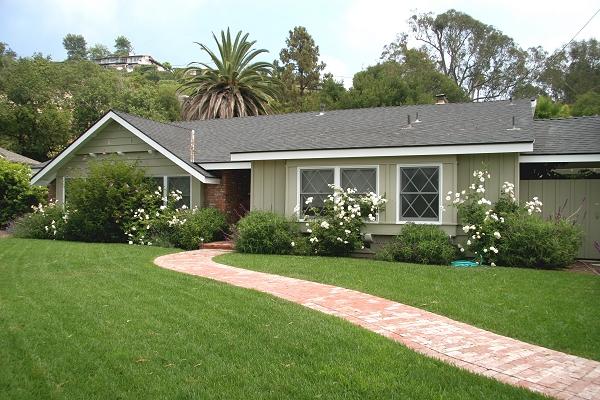 213 Alston Road Santa Barbara, CA 93108 - Photo 1 of 13 a front view of a house with a yard