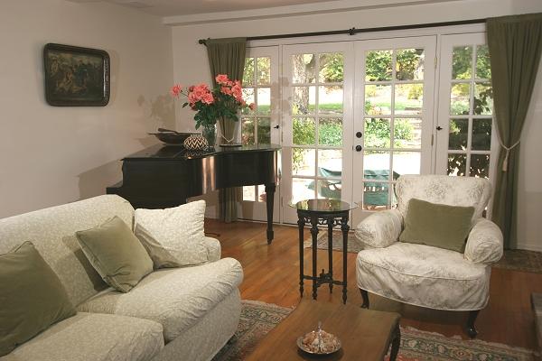 213 Alston Road Santa Barbara, CA 93108 - Photo 4 of 13 a living room with furniture and a large window