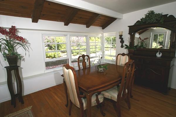 213 Alston Road Santa Barbara, CA 93108 - Photo 5 of 13 a view of a dining room with furniture window and wooden floor