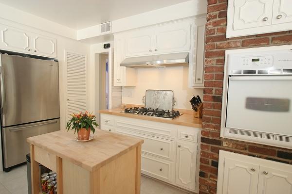 213 Alston Road Santa Barbara, CA 93108 - Photo 6 of 13 a kitchen with cabinets stainless steel appliances and a counter space