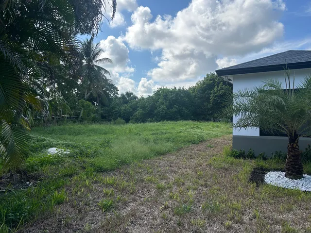 a view of a backyard with garden