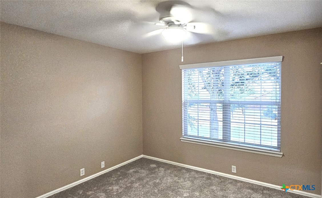 6046 Mule Deer Schertz, TX 78108 - Photo 14 of 19 a view of an empty room with a window