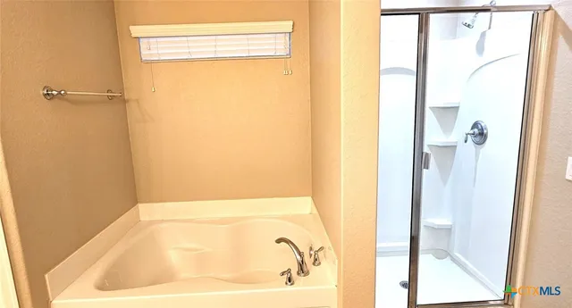 a bathroom with a bathtub