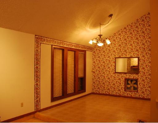 7306 Diamond Ridge Drive Corpus Christi, TX 78413 - Photo 2 of 4 a view of a room with a door and wooden floor