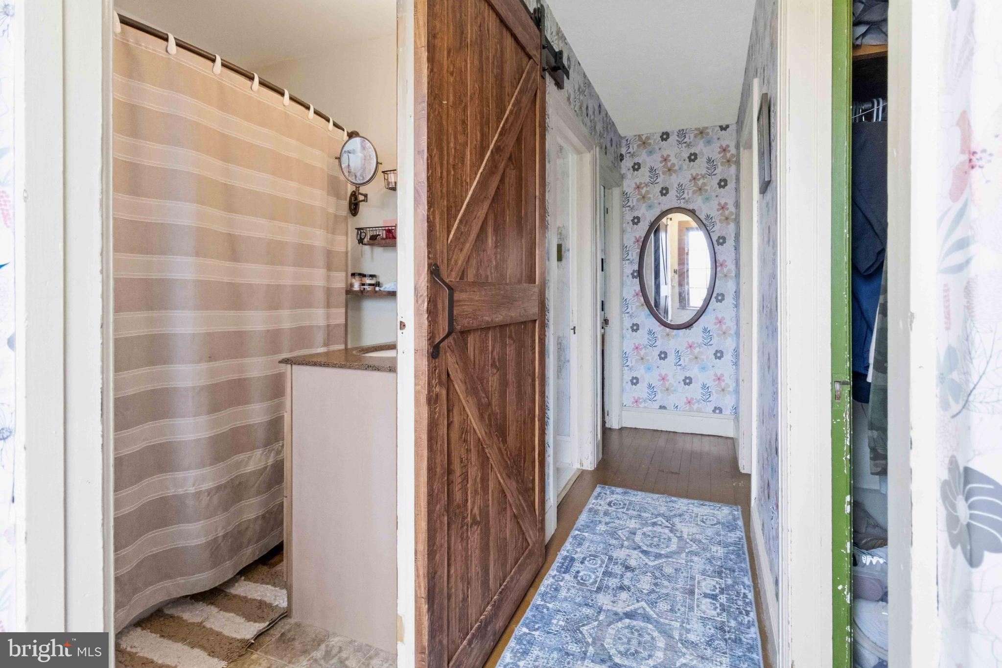 38 State Road Barnesville, PA 18214 - Photo 21 of 46 a view of a hallway with wooden floor and door