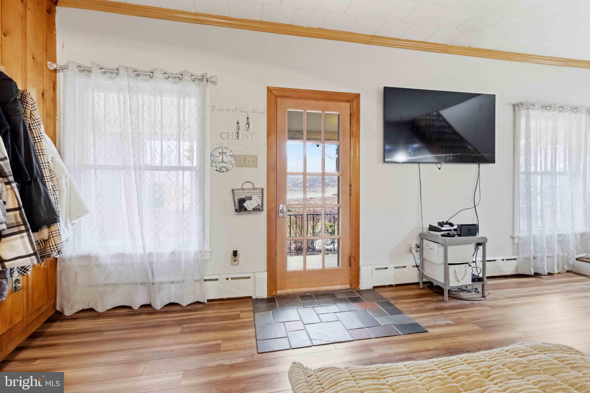 38 State Road Barnesville, PA 18214 - Photo 6 of 46 a living room with a flat screen tv and a window