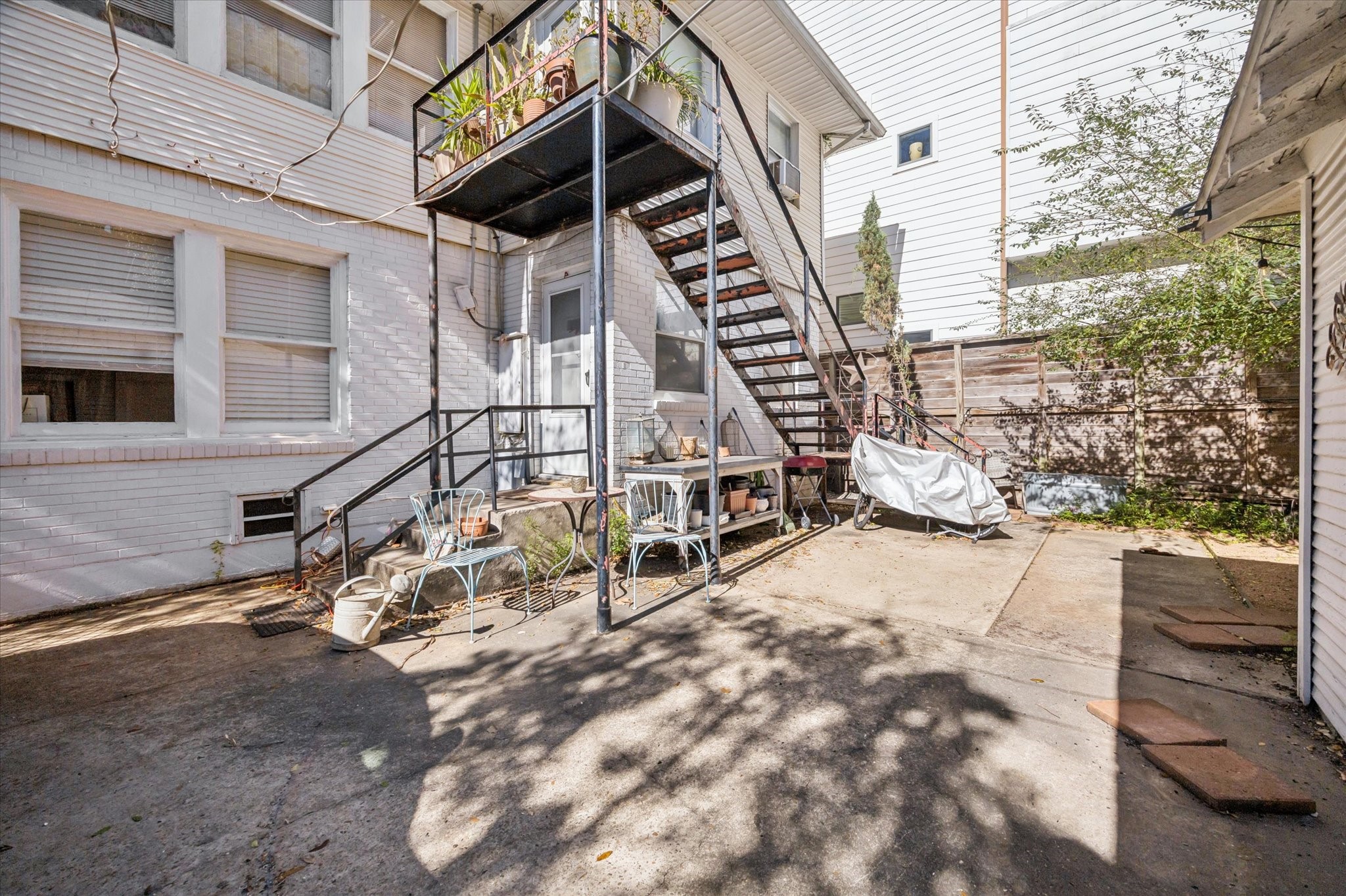 2513 Hazard Street Houston, TX 77019 - Photo 3 of 18 a house with trees in front of it