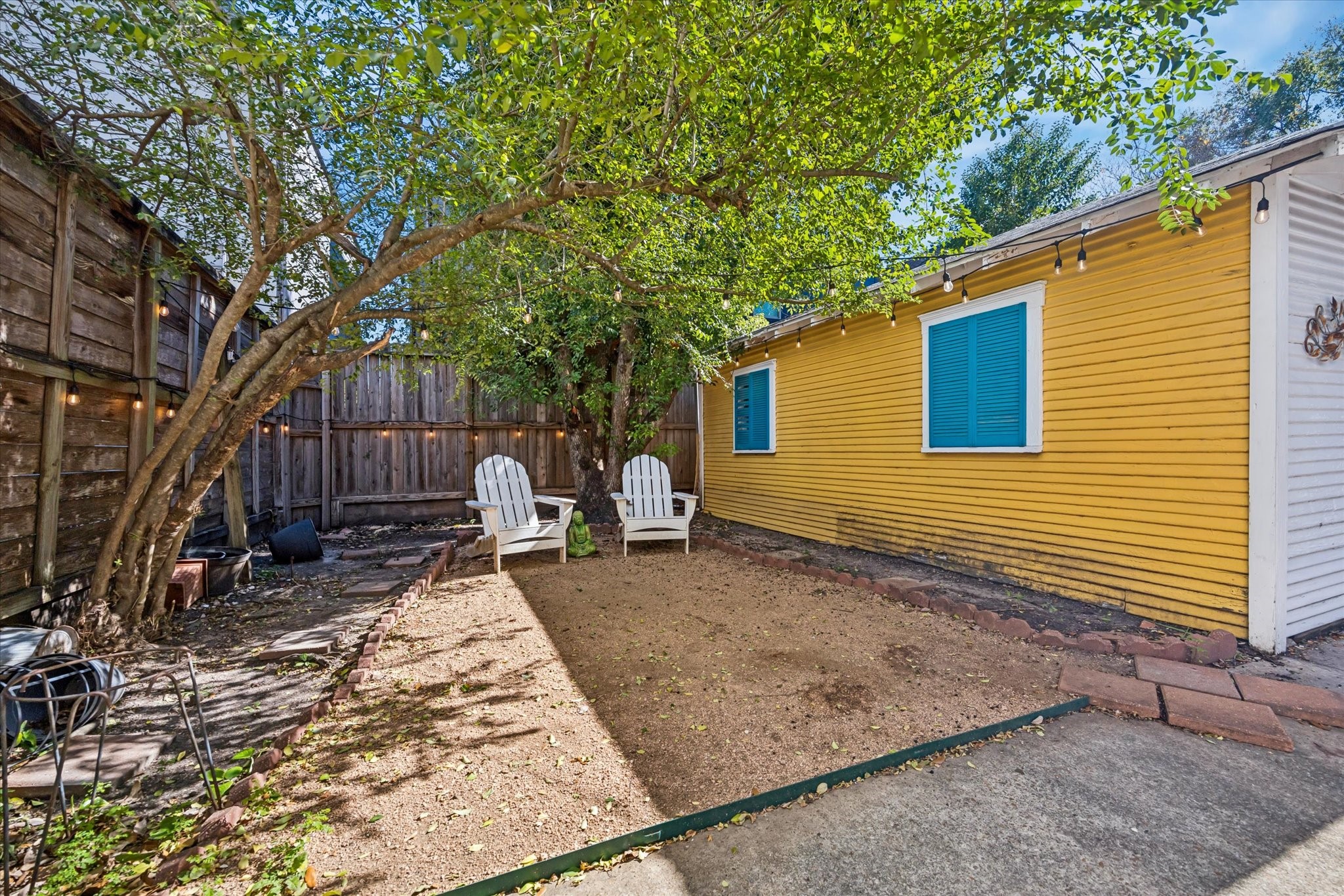 2513 Hazard Street Houston, TX 77019 - Photo 4 of 18 a backyard of a house with seating space