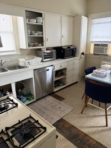 2513 Hazard Street Houston, TX 77019 - Photo 6 of 18 a kitchen with a stove and a sink