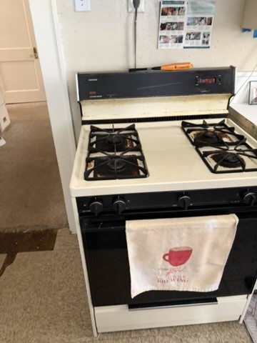2513 Hazard Street Houston, TX 77019 - Photo 7 of 18 a stove top oven sitting inside of a kitchen