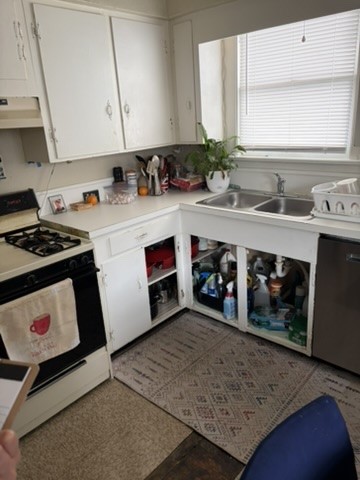 2513 Hazard Street Houston, TX 77019 - Photo 8 of 18 a kitchen with stainless steel appliances granite countertop a sink stove and cabinets