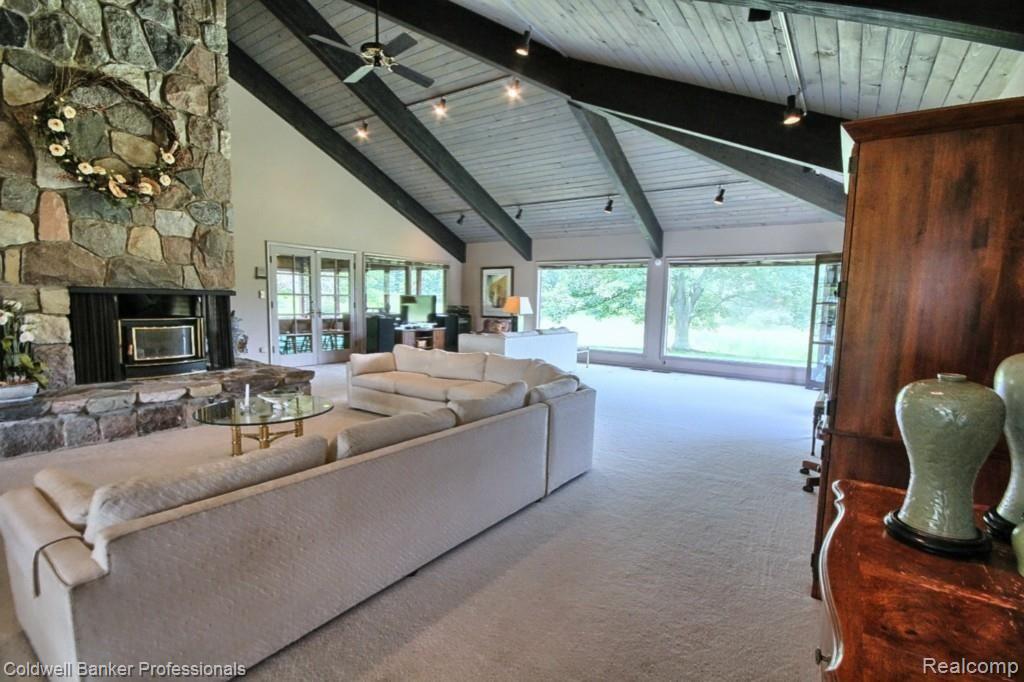 9777 Warren Road Plymouth, MI 48170 - Photo 17 of 32 Great Room with Fieldstone Fireplace