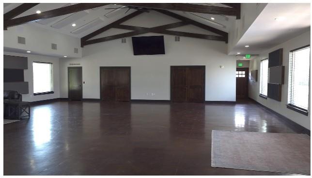 11705 Netleaf Lane Fort Worth, TX 76244 - Photo 17 of 20 a view of a hall with wooden floor and a kitchen