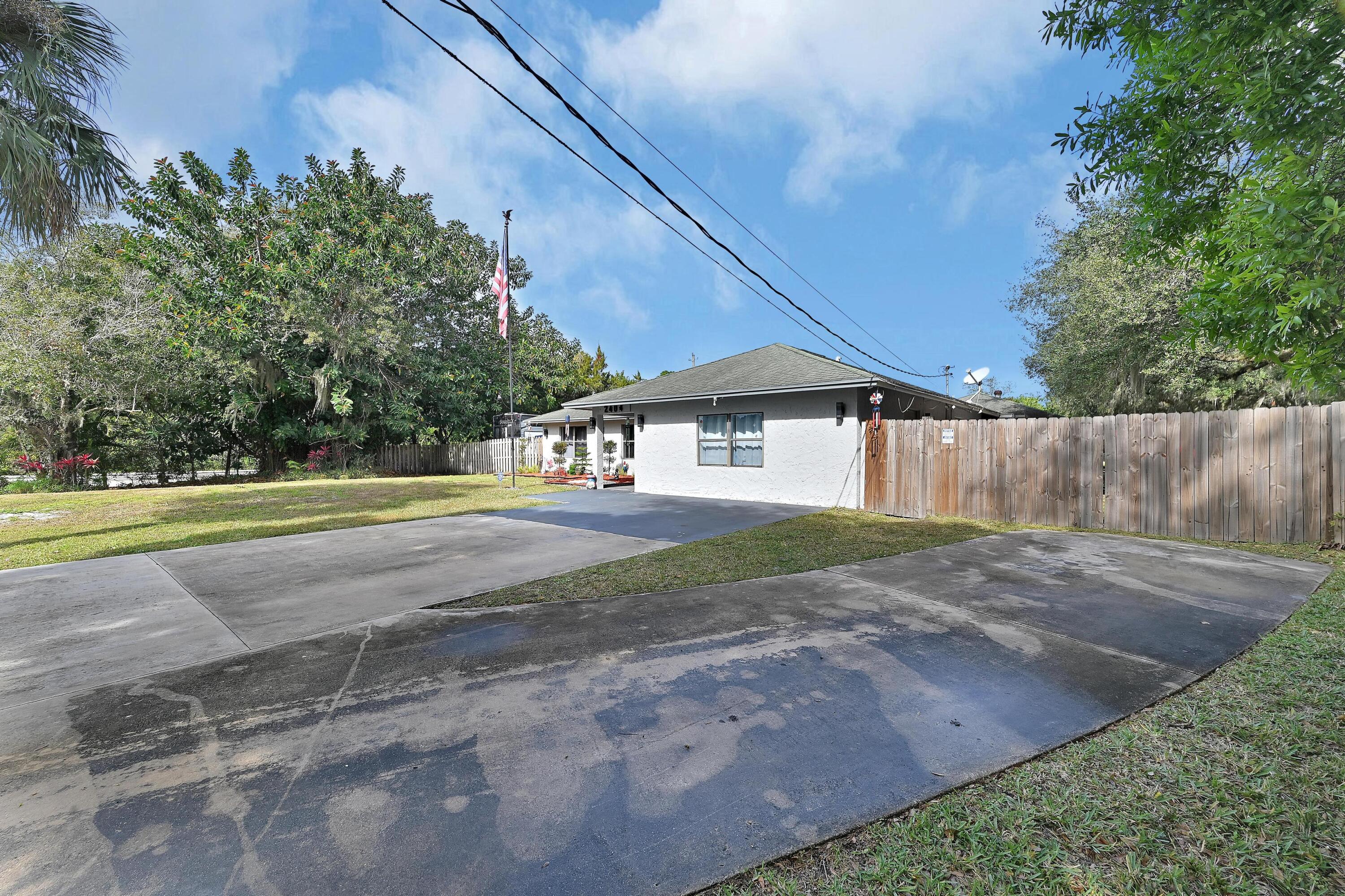 2404 Dade Road Fort Pierce, FL 34982 - Photo 59 of 61 DRIVEWAY PARKING