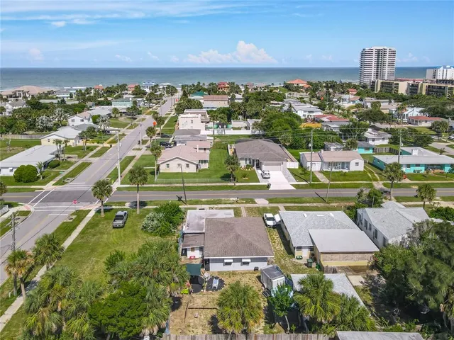 a view of backyard with tub and trees
