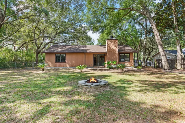 a front view of a house with swimming pool