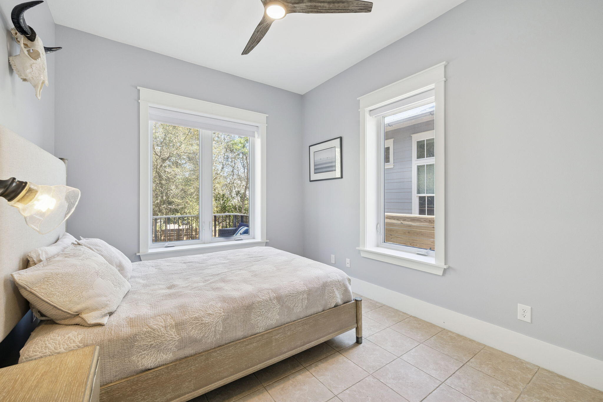 86 Bullard Road Santa Rosa Beach, FL 32459 - Photo 28 of 34 a bedroom with a bed and wooden floor