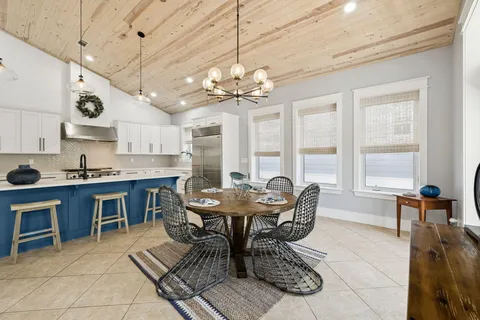 a view of house with backyard space and garden