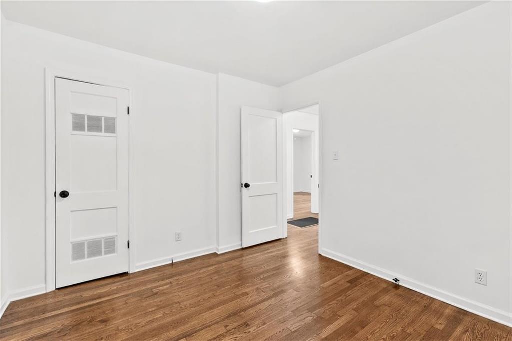 3406 Jackson Drive Decatur, GA 30032 - Photo 18 of 28 a view of an empty room with wooden floor