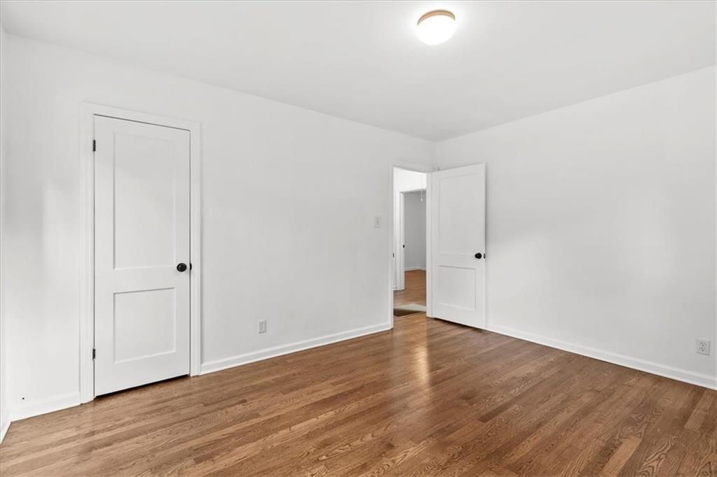 3406 Jackson Drive Decatur, GA 30032 - Photo 20 of 28 a view of an empty room with wooden floor
