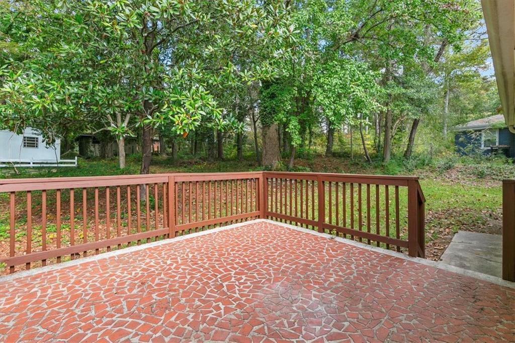 3406 Jackson Drive Decatur, GA 30032 - Photo 24 of 28 a balcony with trees in front of it
