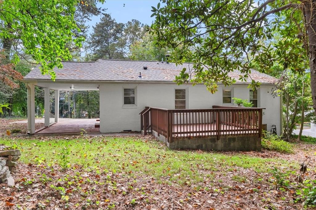 3406 Jackson Drive Decatur, GA 30032 - Photo 25 of 28 a view of a house with a yard and deck