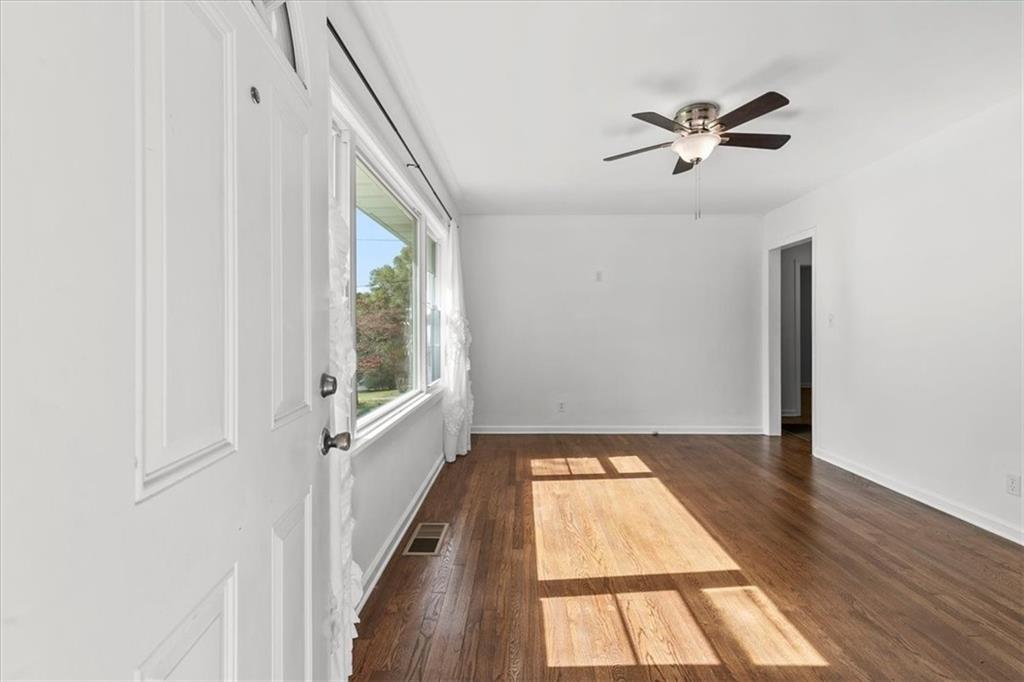 3406 Jackson Drive Decatur, GA 30032 - Photo 4 of 28 a view of hallway with window and wooden floor