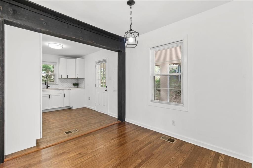 3406 Jackson Drive Decatur, GA 30032 - Photo 8 of 28 a view of a kitchen with wooden floor and a window